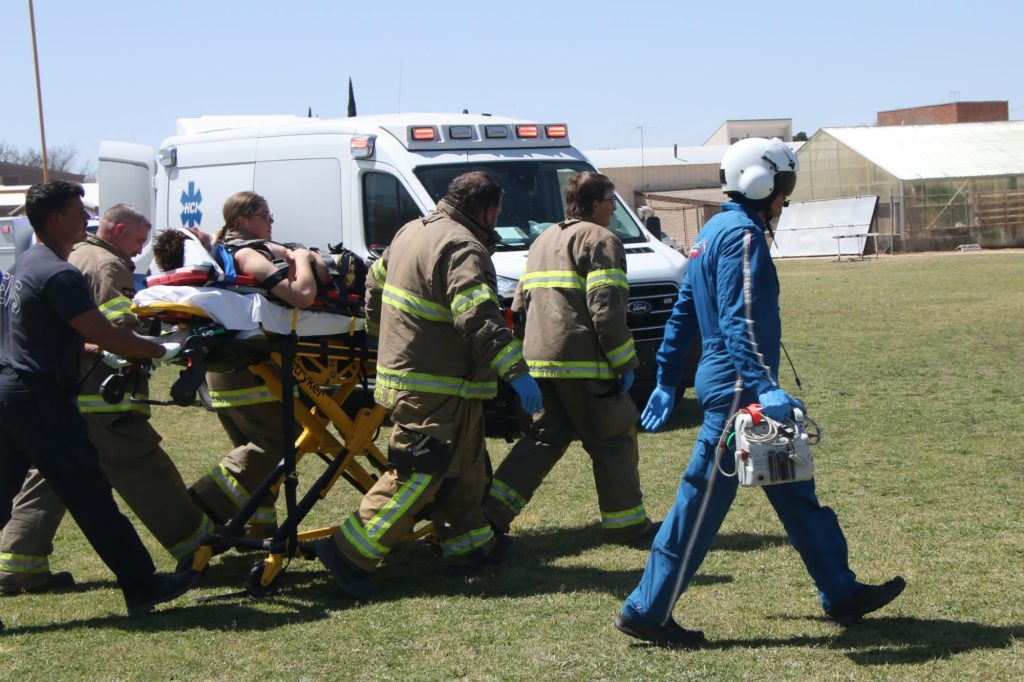 Saint David Fire District firefighters working with ambulance and flight personnel during a mass casualty incident demonstration.