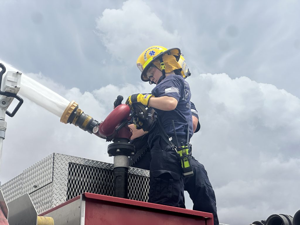Saint David Fire District members practicing water monitor operation.